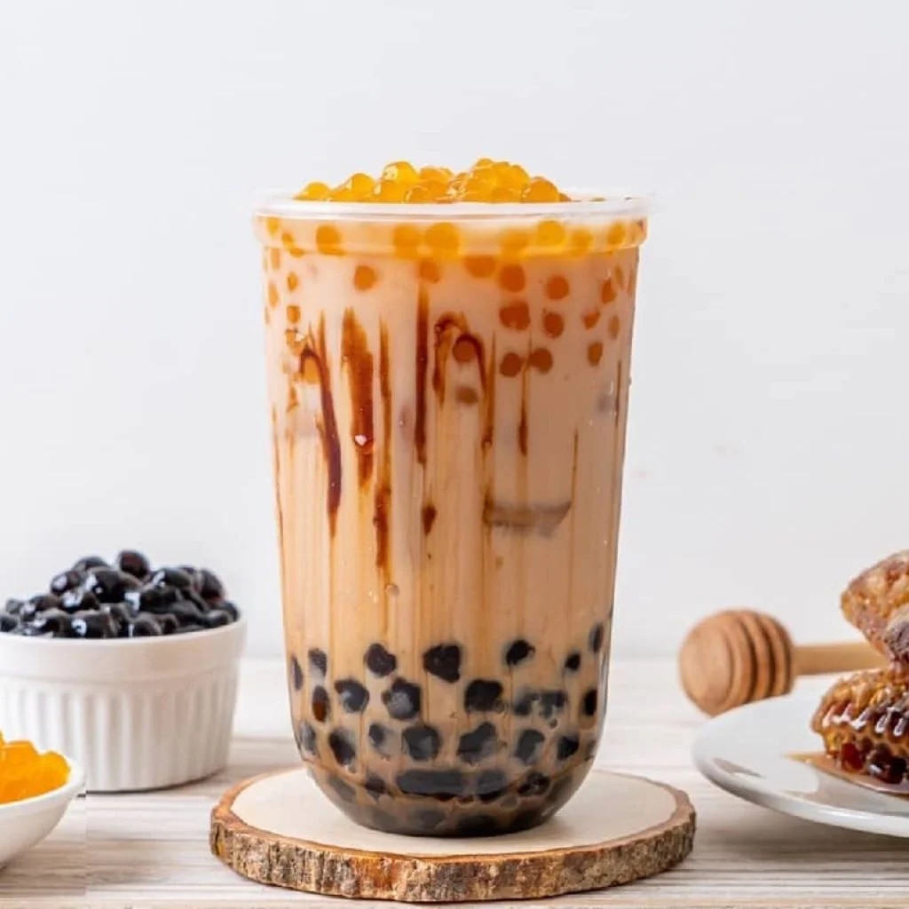 Hình ly trà sữa đẹp, một tác phẩm nghệ thuật trong tay người pha chế